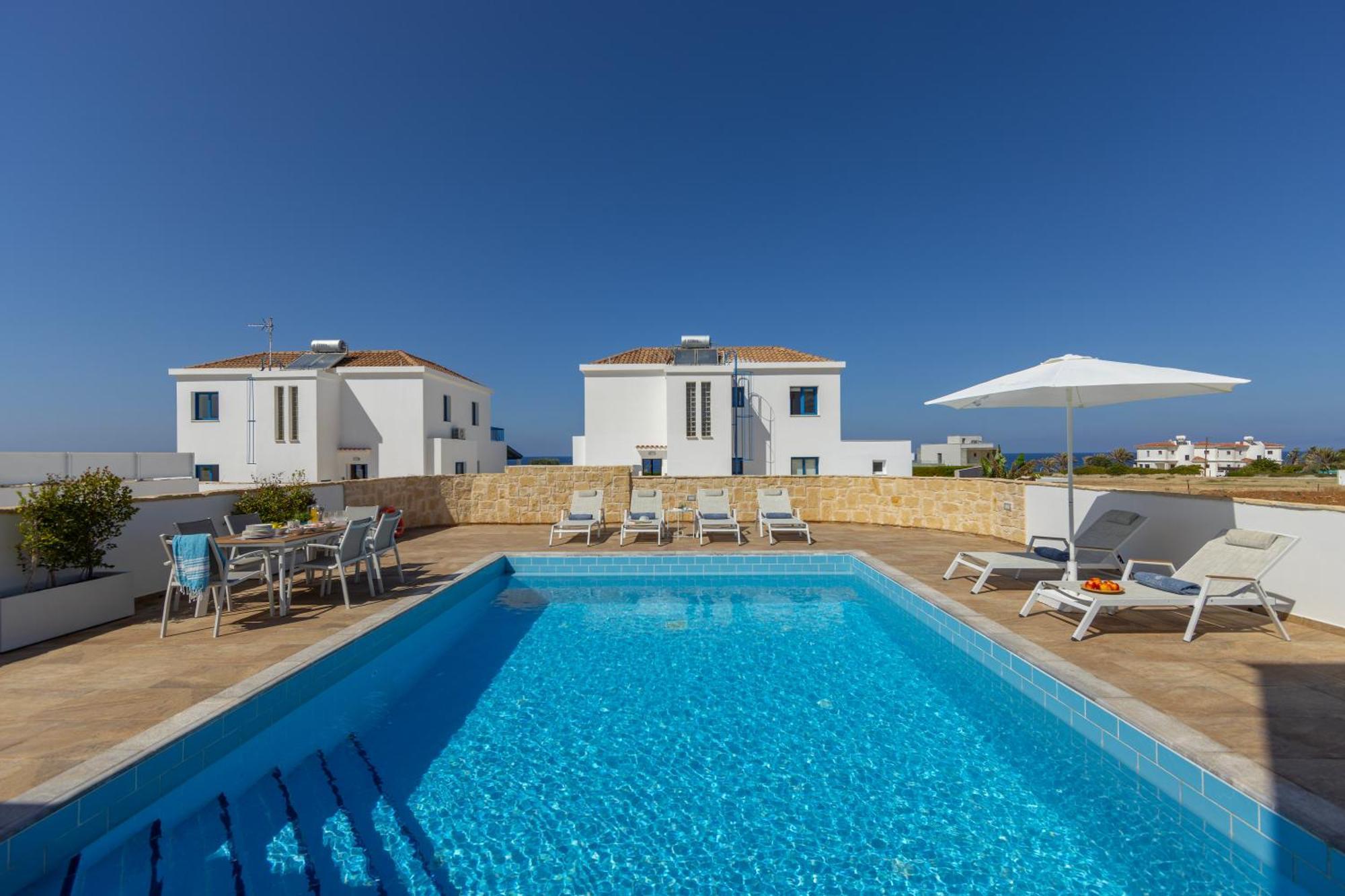 Diana Seaside Villas Pomos Bagian luar foto