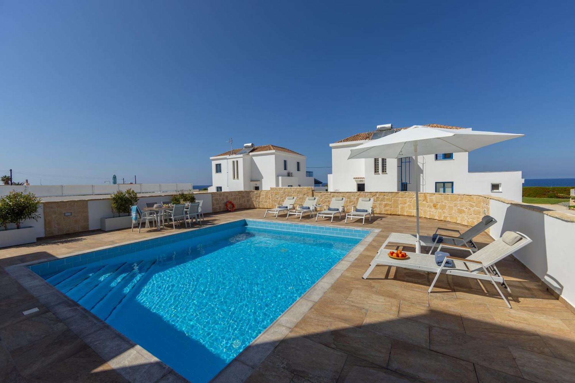 Diana Seaside Villas Pomos Bagian luar foto